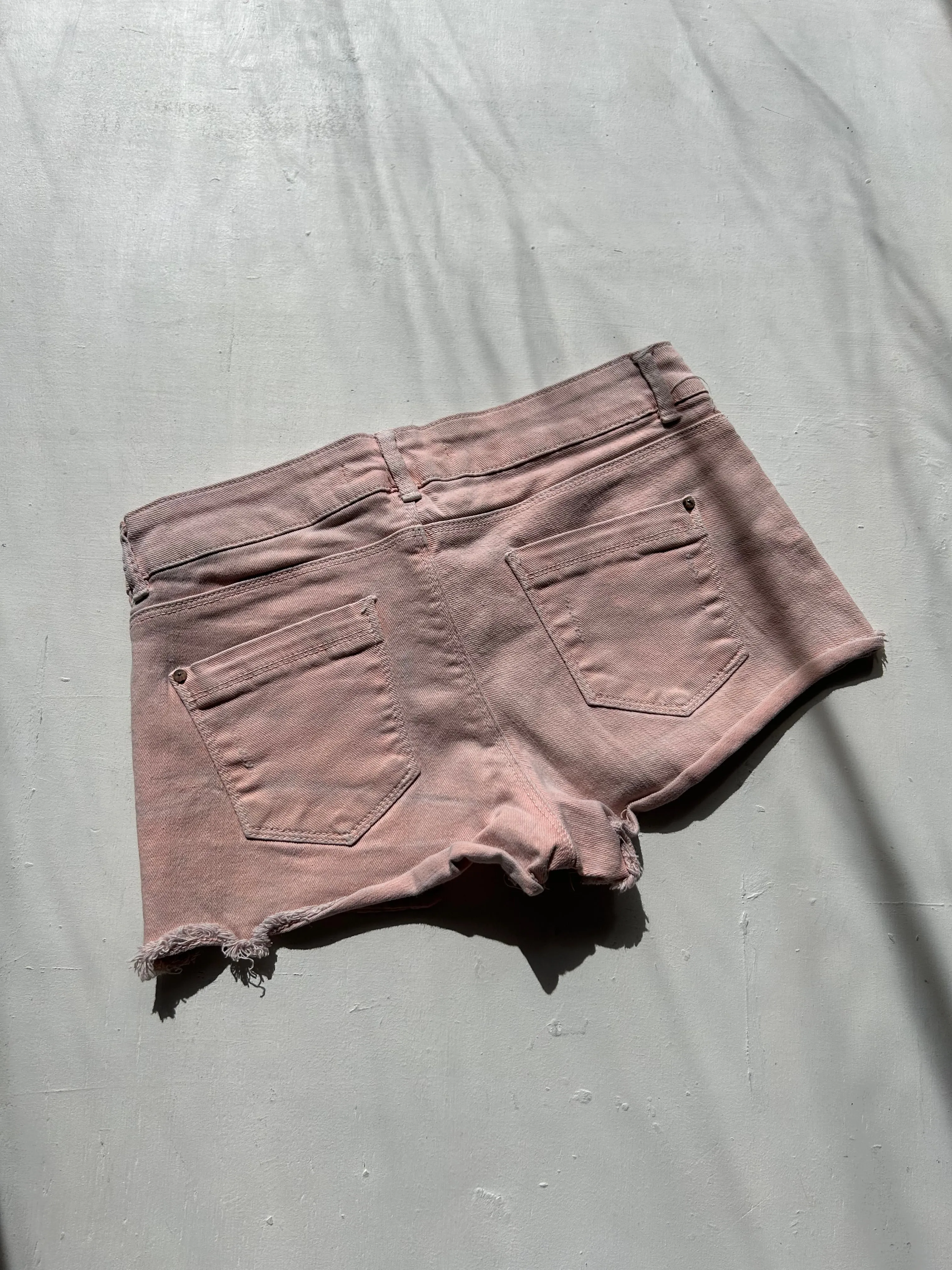 Baby pink denim low rise mini/ micro short (XS)