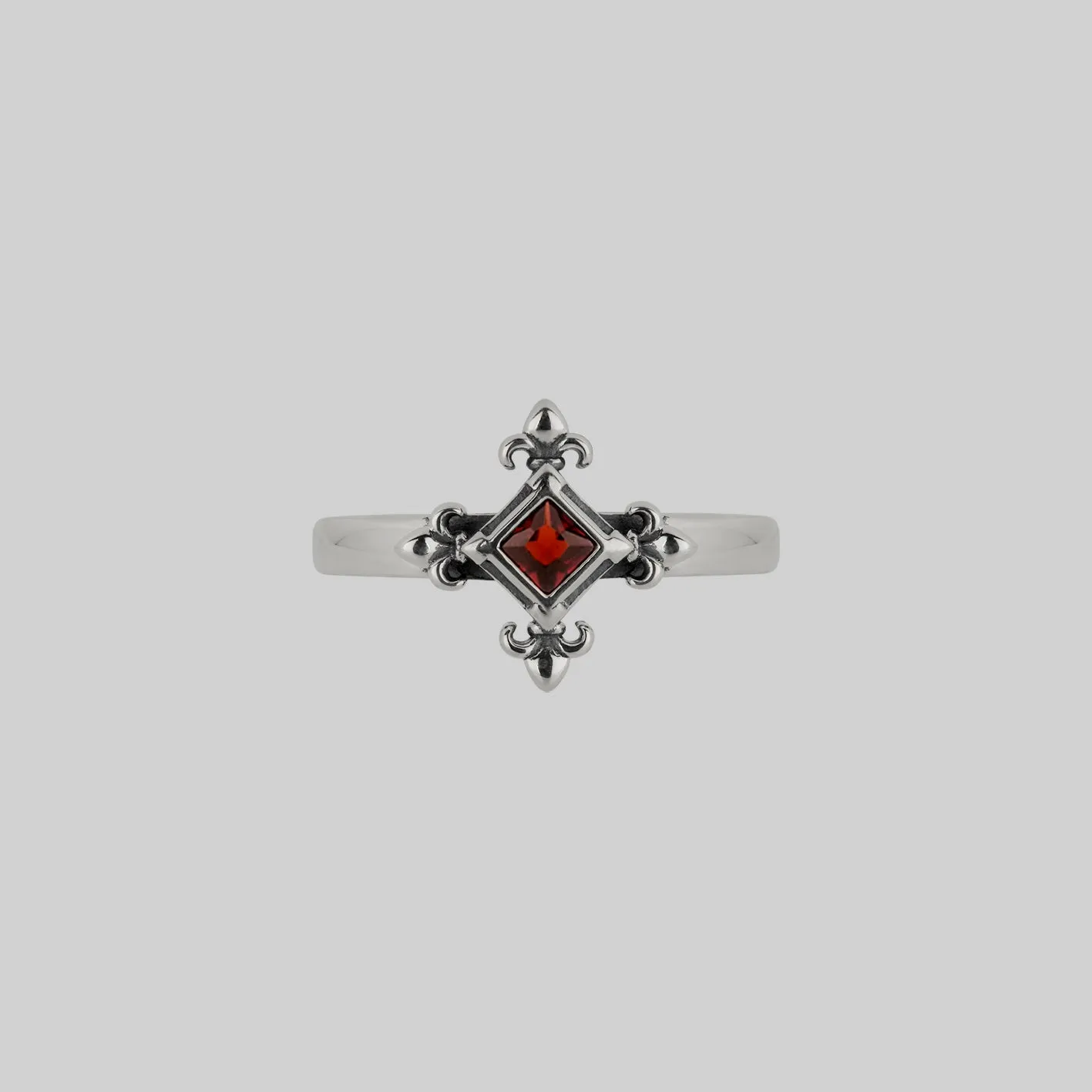 CRIMSON. Medieval Fleur de Lis Garnet Ring - Silver