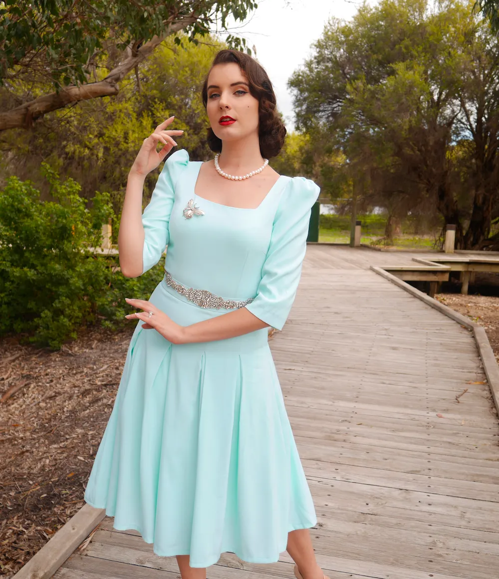 Kate pleated dress- turquoise pleated dress with slight puff sleeves